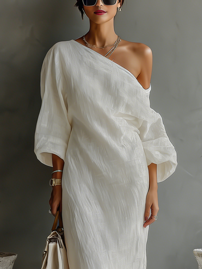 Elegant Flowing Dress in Ivory White with Off-Shoulder Design
