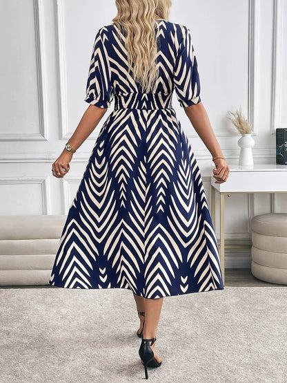 Selina – Geometric Flow Midi Dress